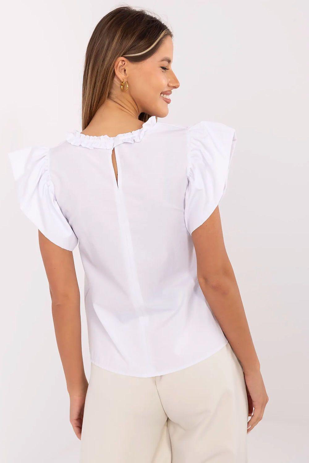 White polka dot blouse with ruffle frill sleeves and center-back seam