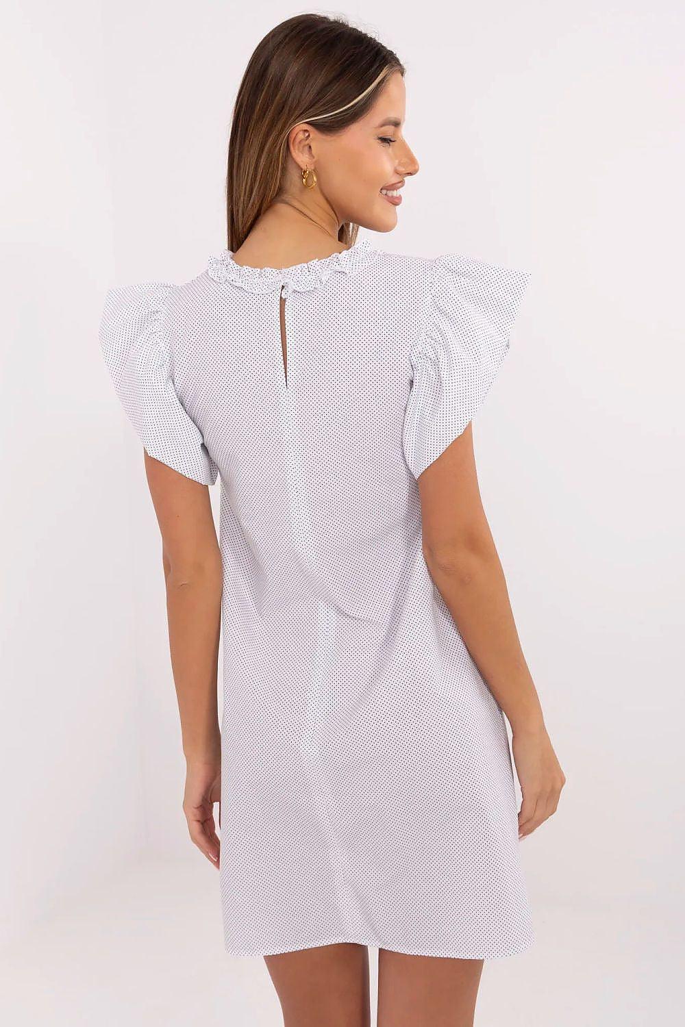 White daydress with puff sleeves and ruffled collar, back and side view
