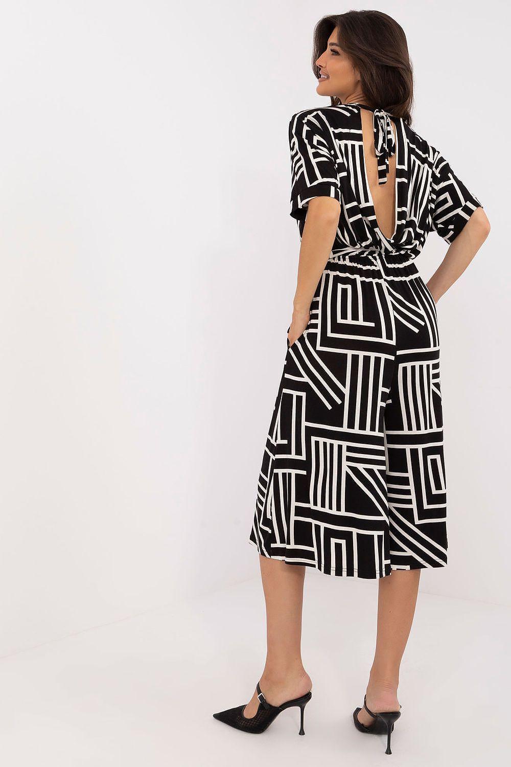 Black and white geometric print midi dress, back side, short sleeves and waist tie