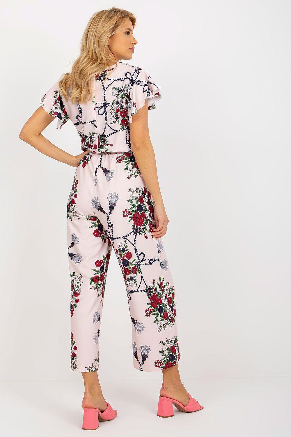 Pink floral two-piece pant set with ruffled shoulders and wide-leg culottes