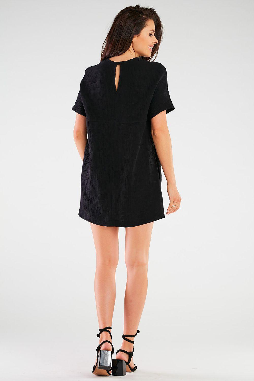 Black mini daydress, back view, crew neck and keyhole slit at back