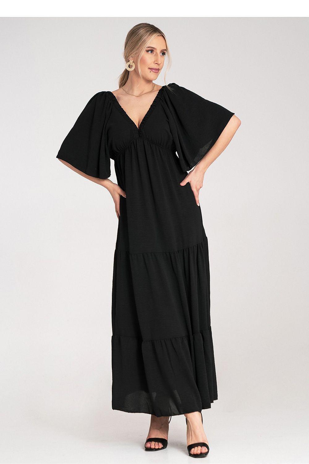Figl daydress in black with V-neck, gathered bodice, short wide sleeves, tiered maxi skirt
