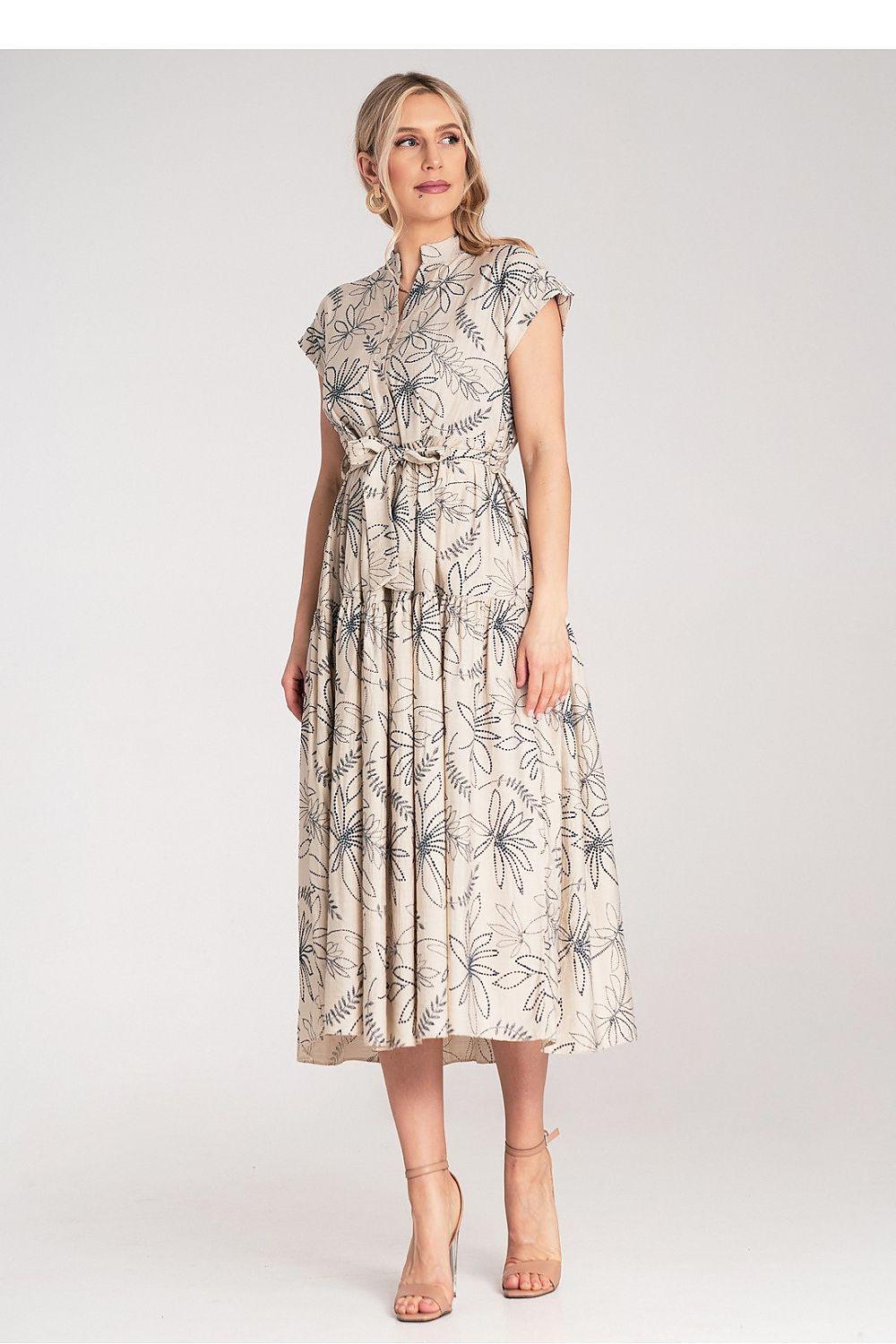 Beige leaf-print daydress with short sleeves, buttoned collar, and tie waist belt