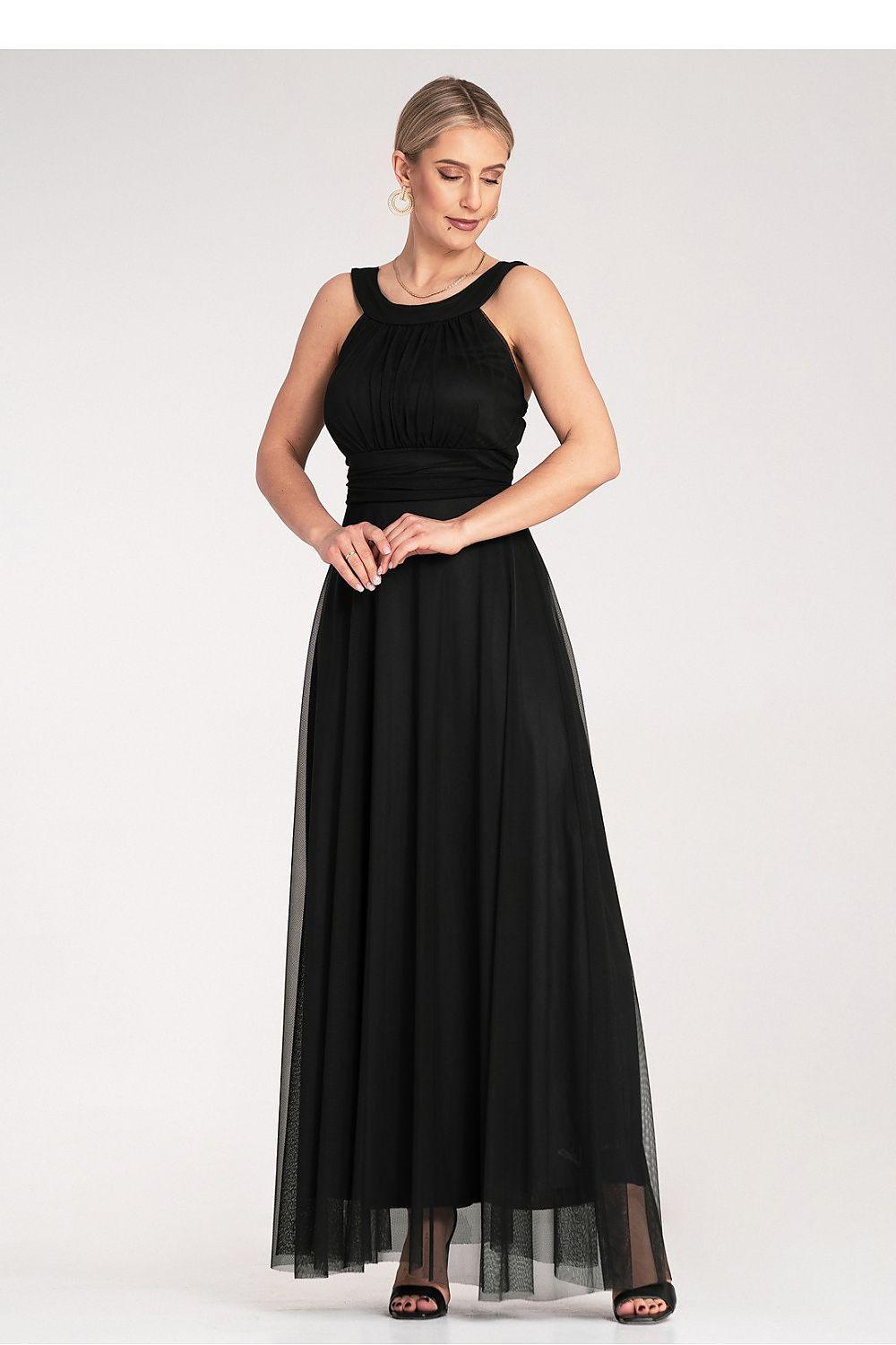 Black halter evening dress with sleeveless bodice and sheer layered skirt