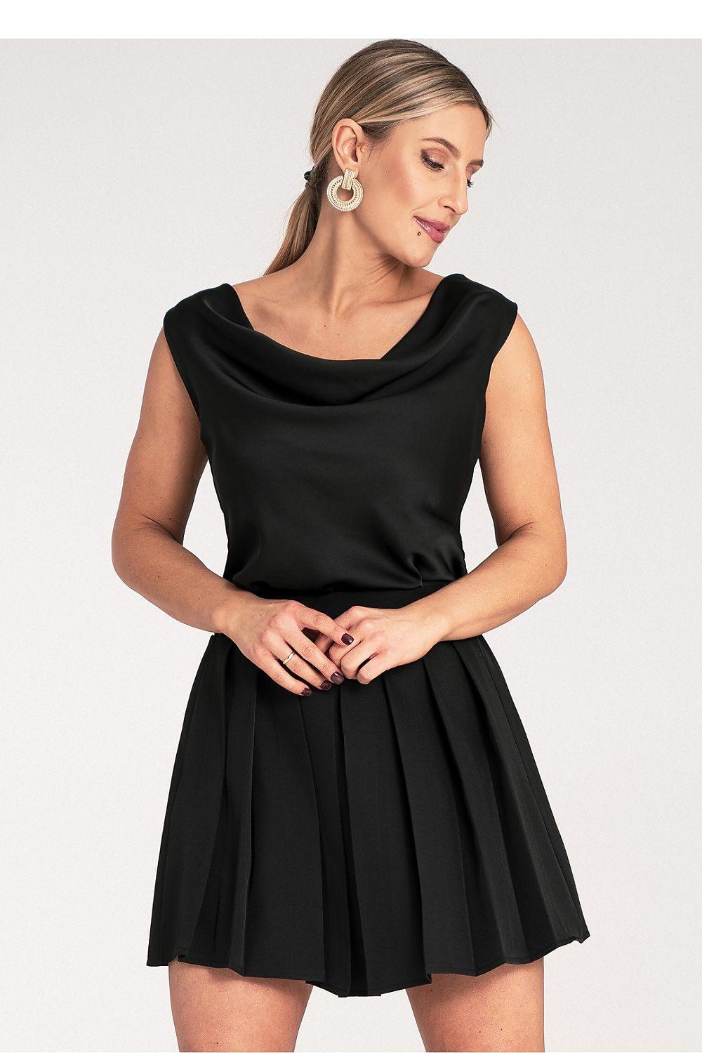 Black pleated short skirt with gathered waistband and flared hem