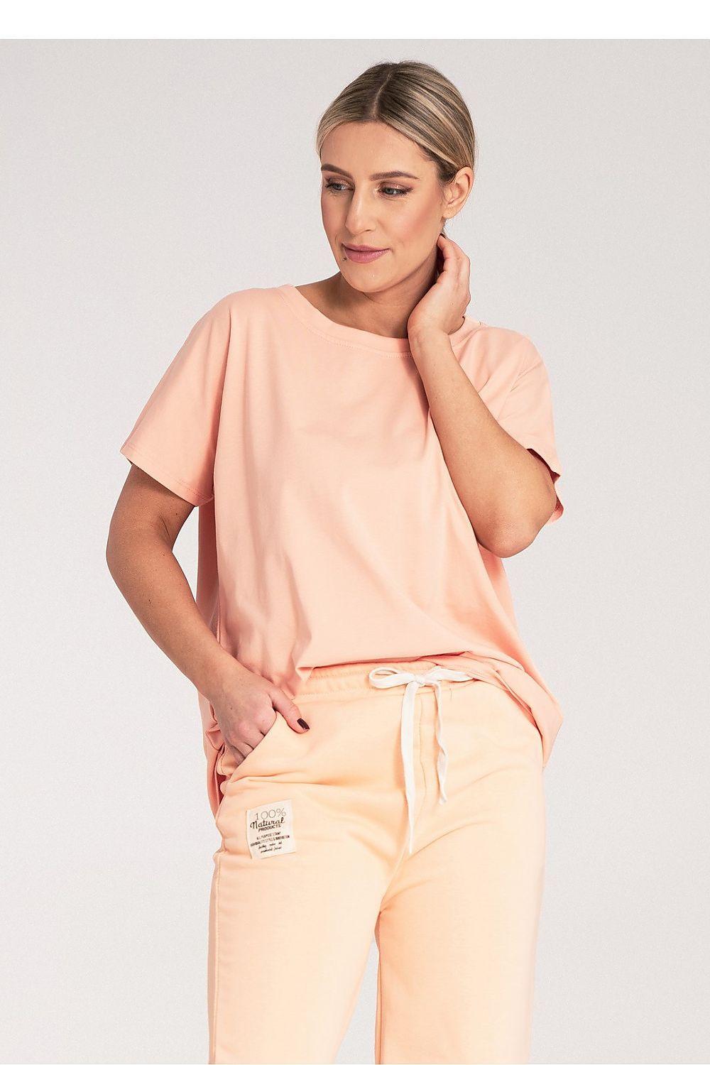 Women's peach T-shirt with short sleeves and round neckline, relaxed drape