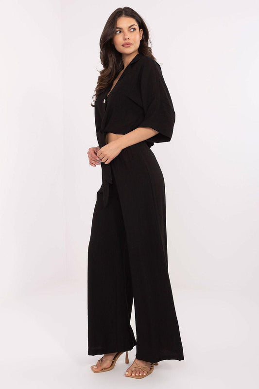 Black wide-leg set with tie-front cropped shirt and wide pants, side view