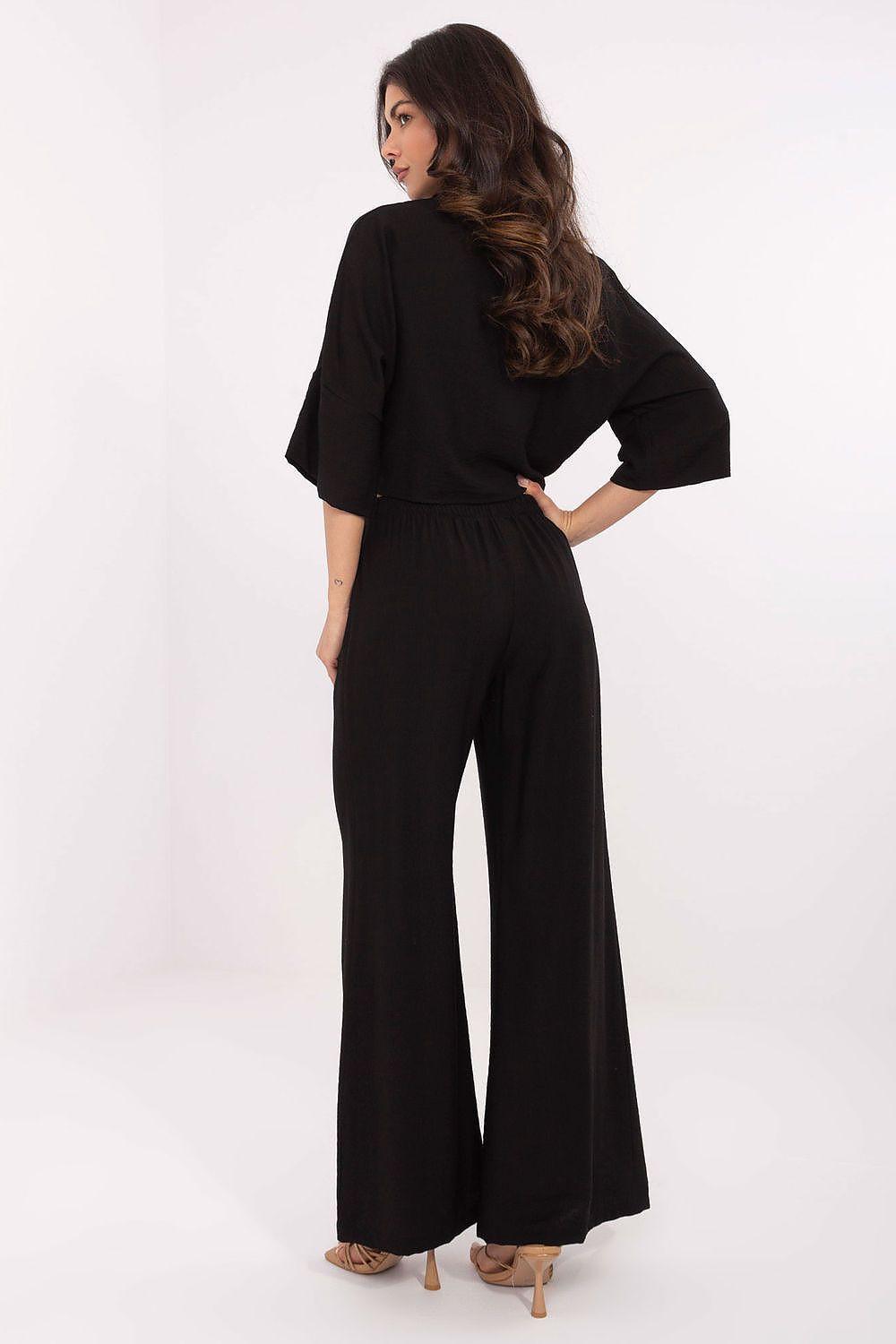 Black wide-leg set with back-tied cropped shirt and gathered waist wide pants