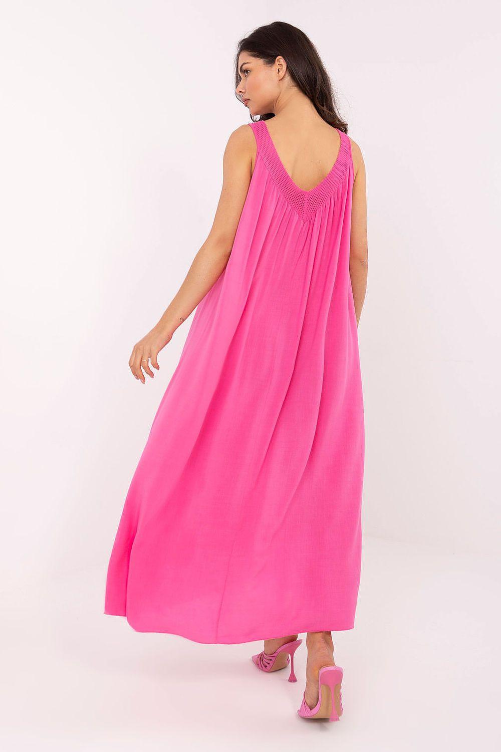 Pink sleeveless daydress with scoop back and flowing long skirt, rear view
