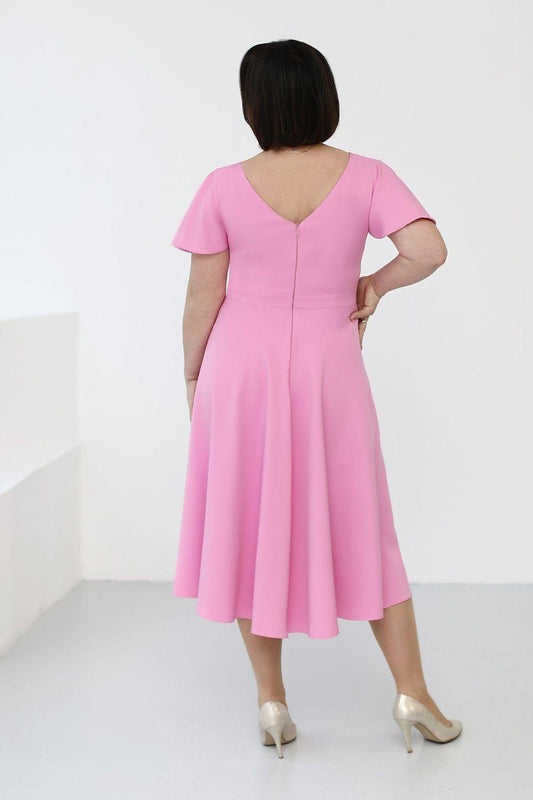Pink V-neck cocktail dress, back view, short sleeves, knee-length