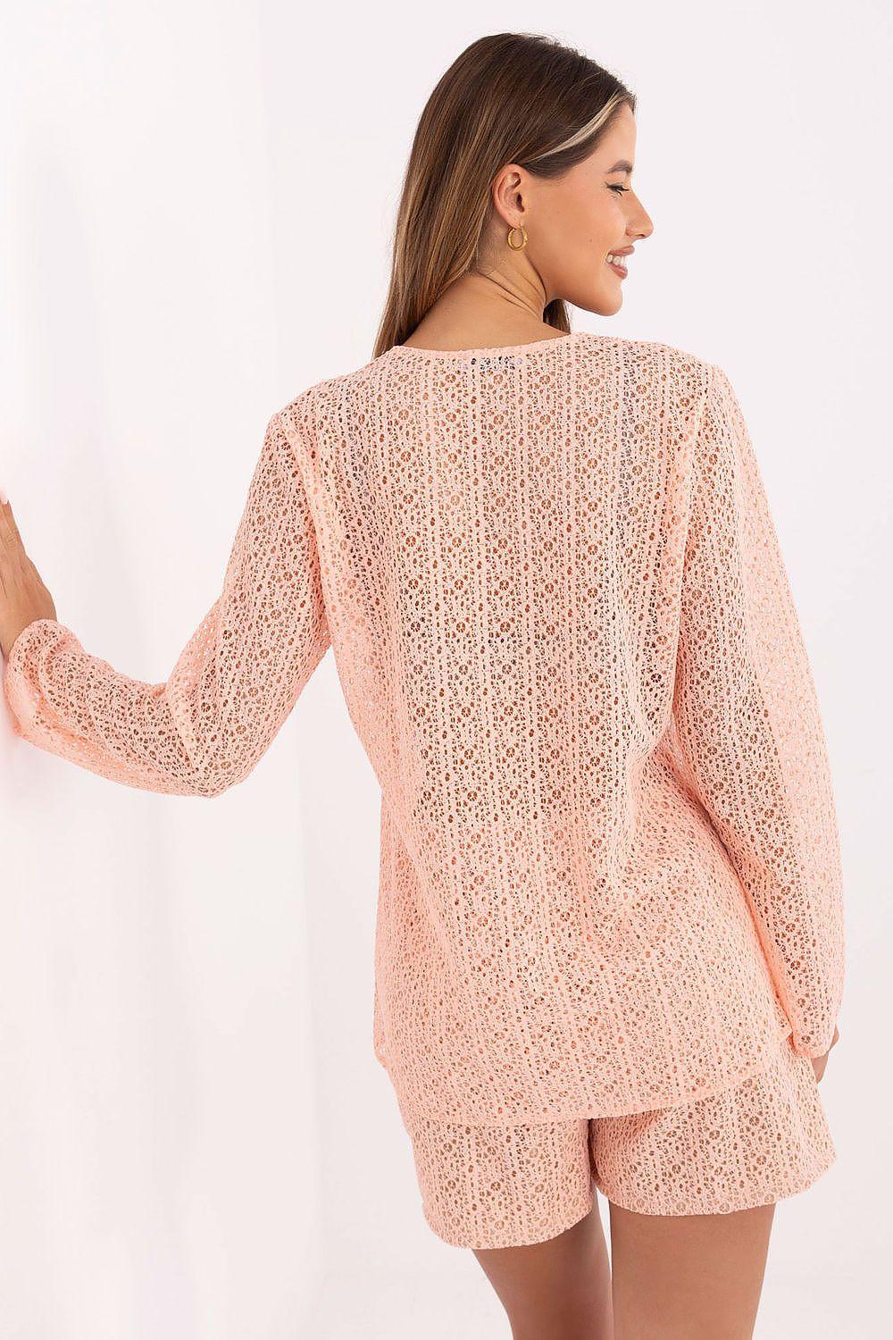 Lace shirt and shorts set, pink lace, open back with long sleeves and matching shorts.