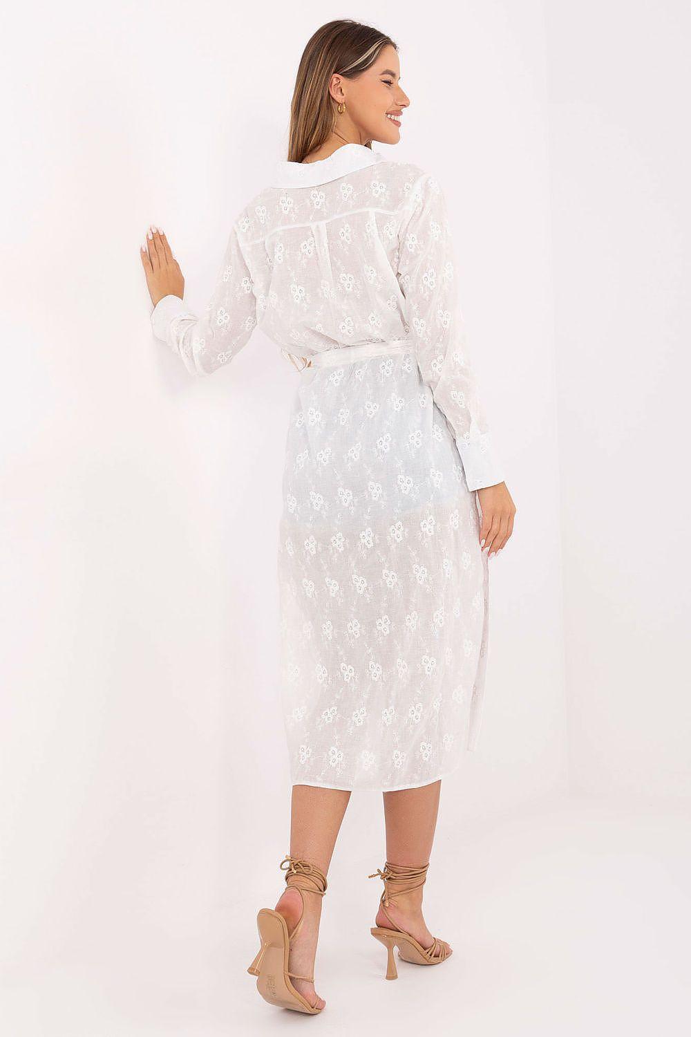 White embroidered long-sleeve shirt-dress with belt, back view and rolled sleeve cuffs
