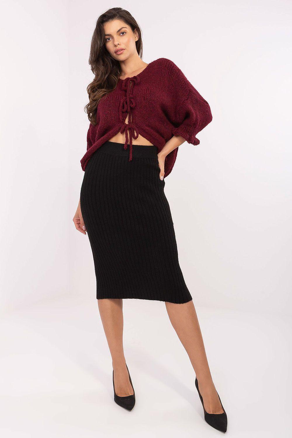 Black ribbed knit midi skirt with comfort fit, straight fitted hem