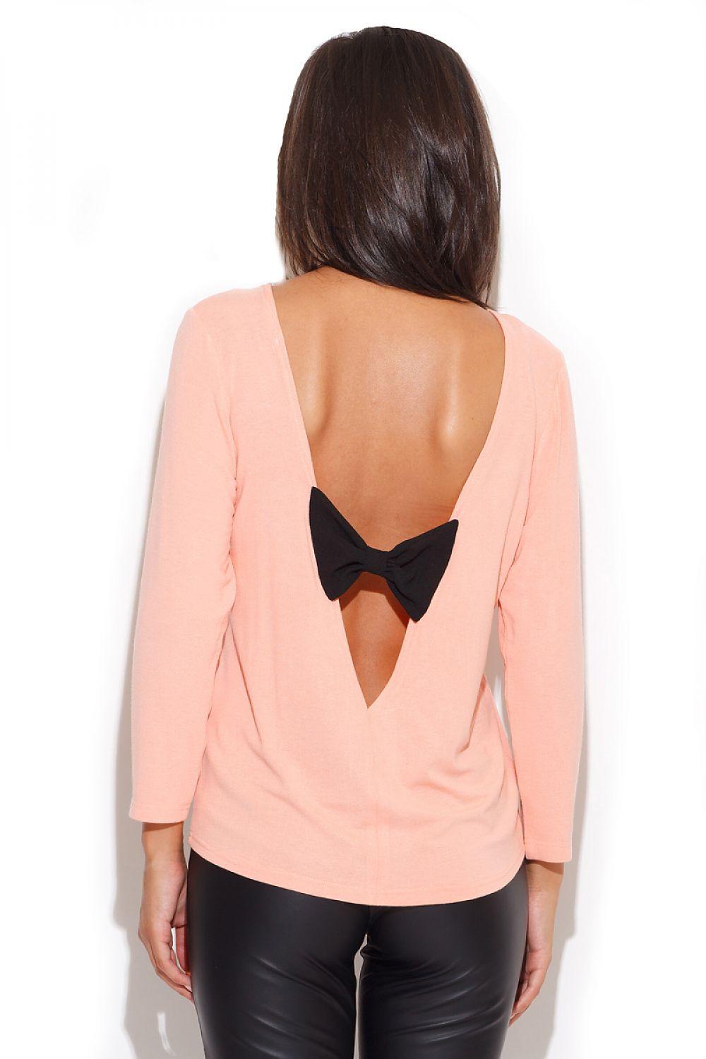 Backless pink blouse with deep V back and black bow detail