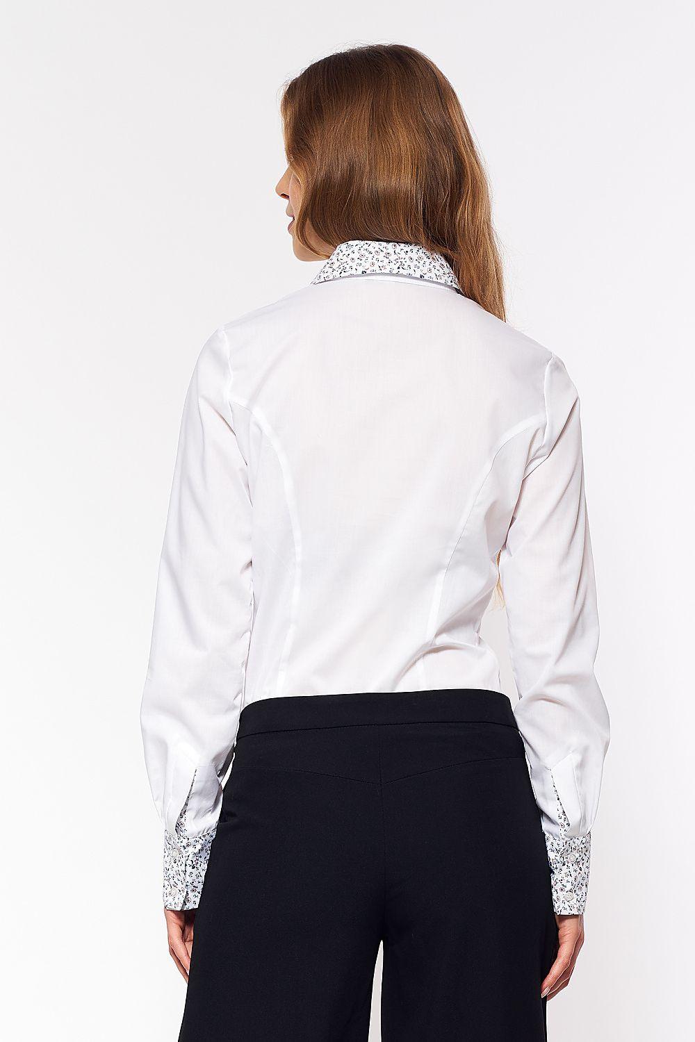 White long sleeve shirt, back view, with patterned trim at cuffs and yoke