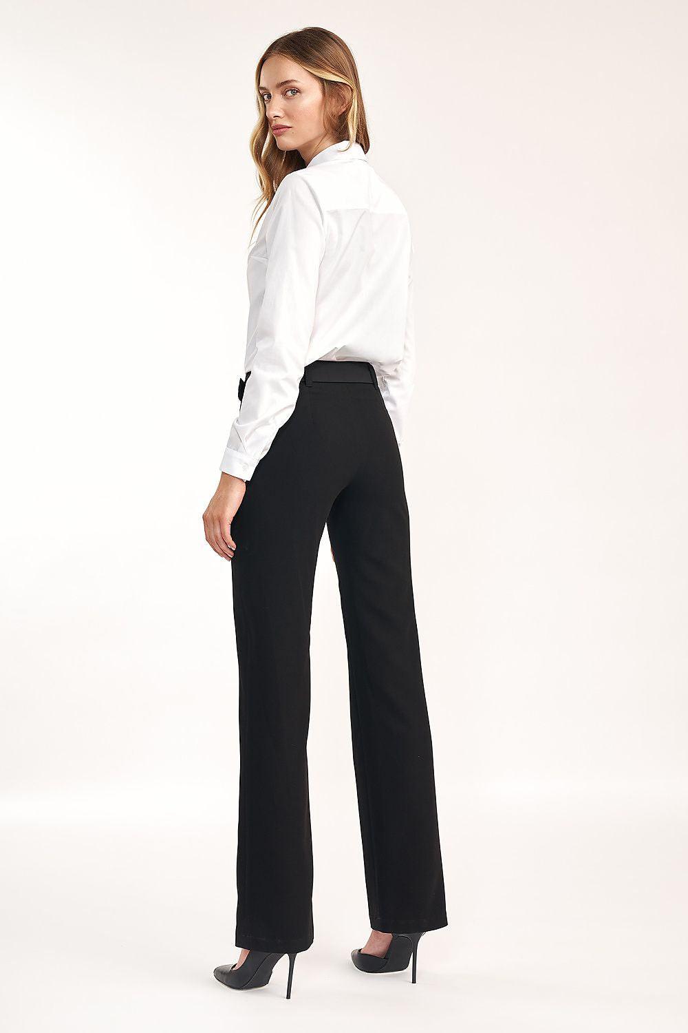 White long-sleeve button-up shirt with pointed collar and button front