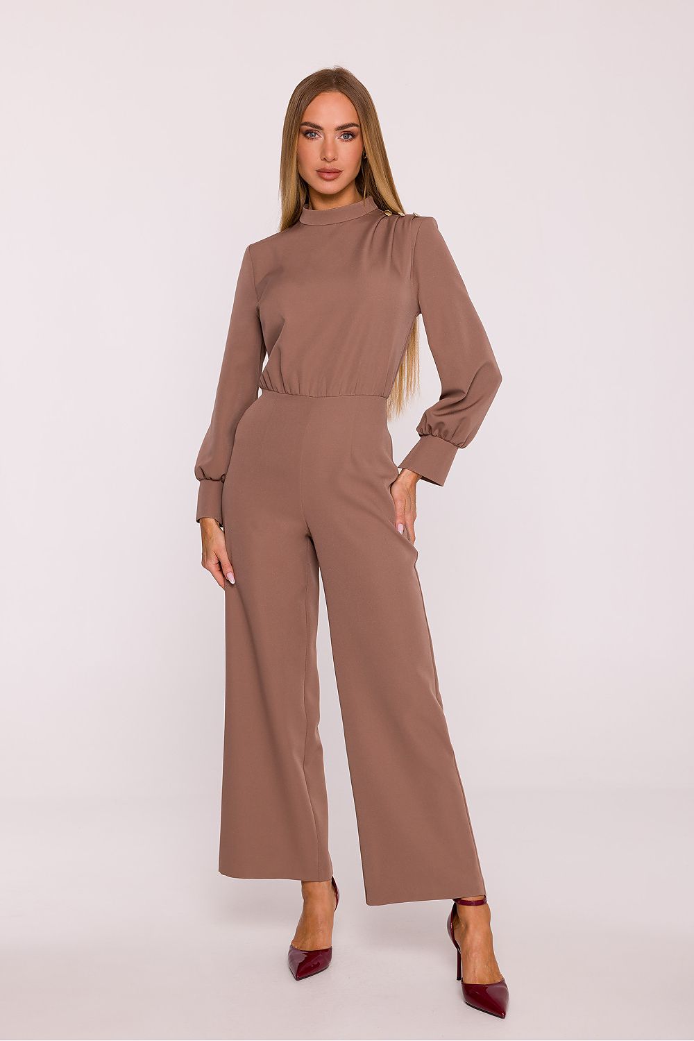 Brown matte jumpsuit with mock neck, long sleeves, and fitted waist