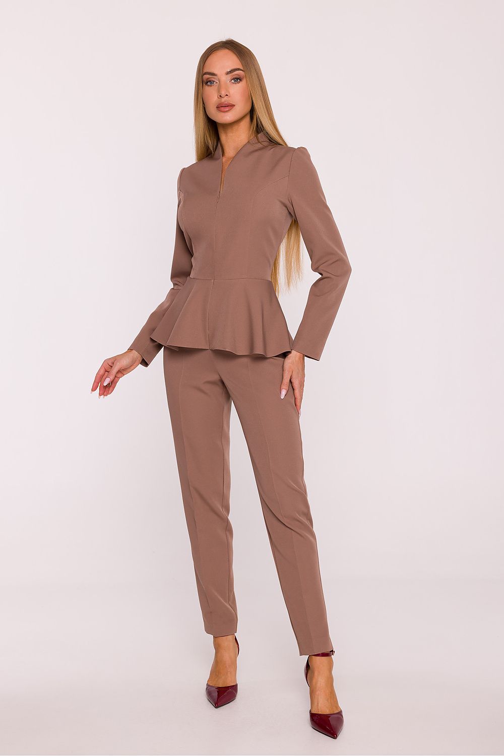 Brown long-sleeve jumpsuit with flounce waist and peplum-style hem