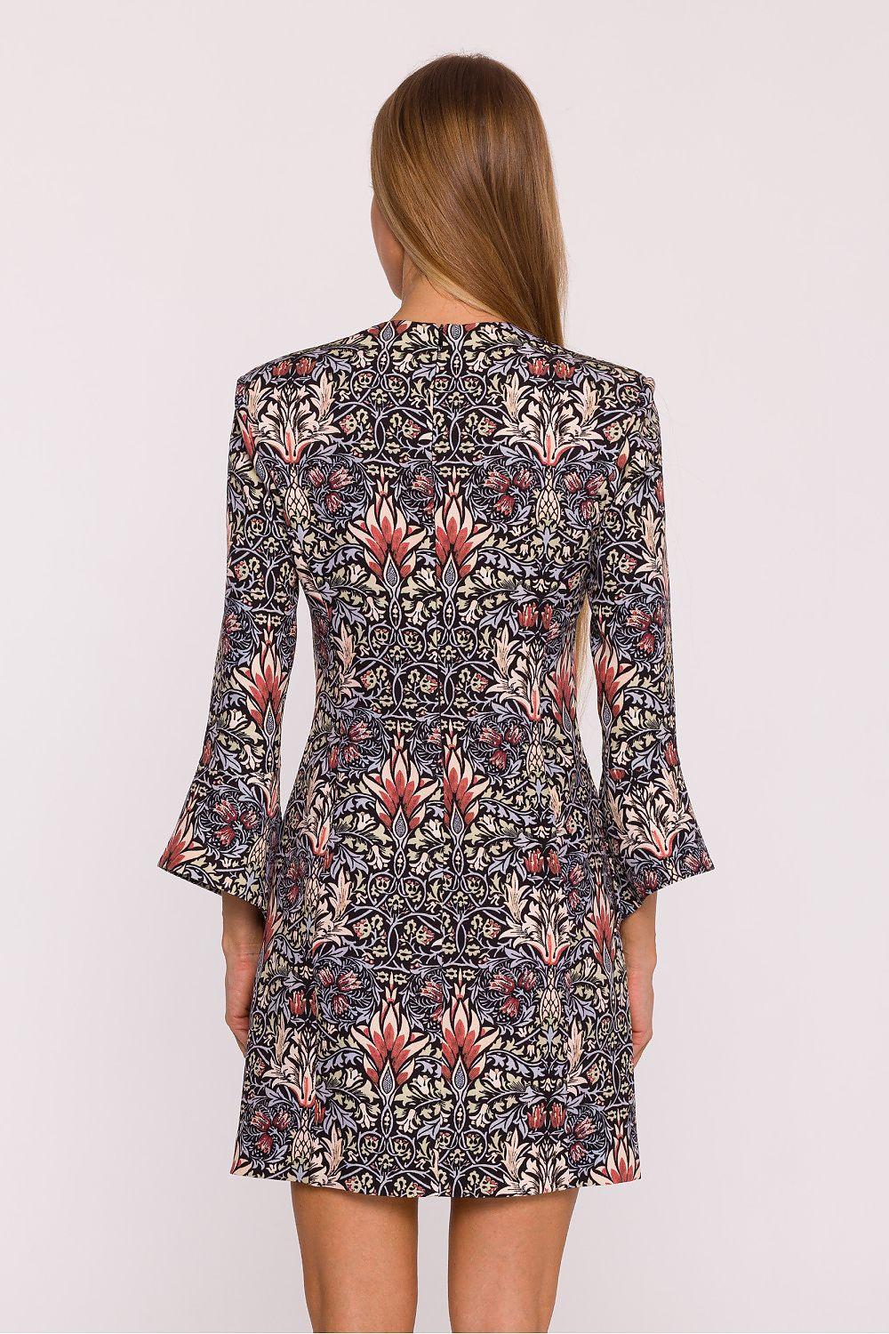 Ornate floral daydress with V-neck and flared bell sleeves, back view