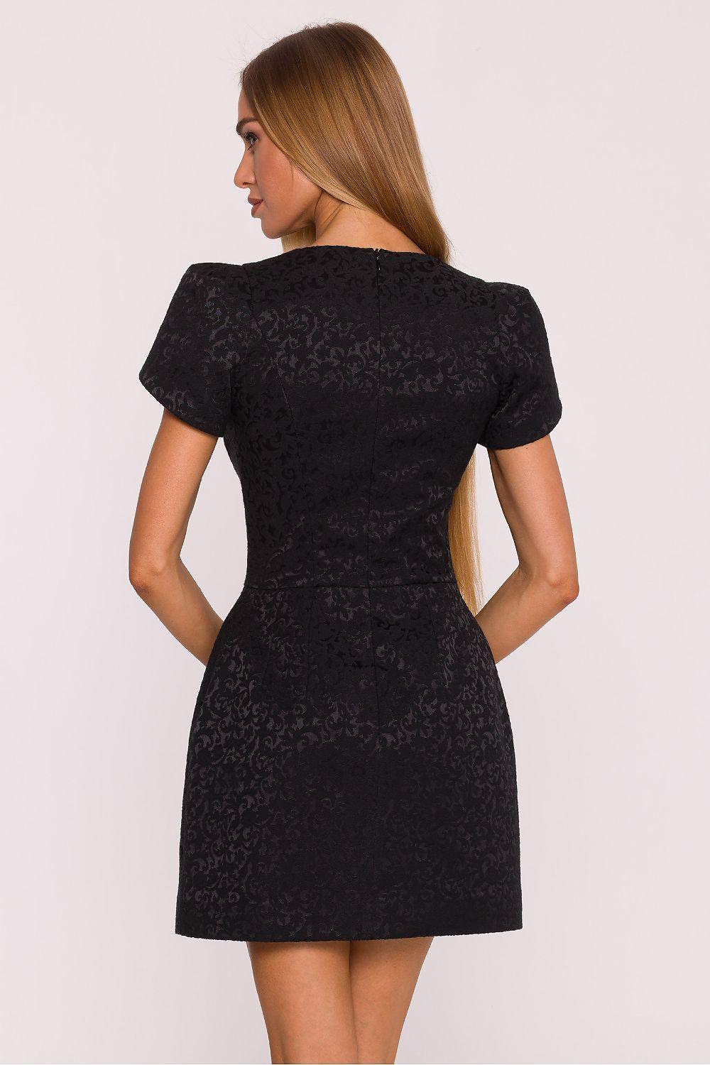 Moe cocktail dress in dark color, V-back, short sleeves, fitted above-knee