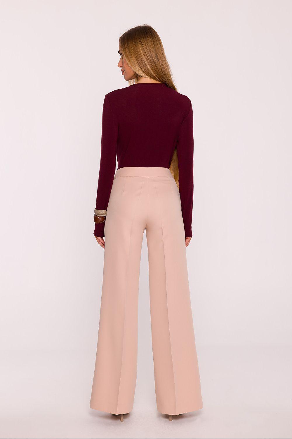 Women's high-waist wide-leg trousers in light pink-beige, back view