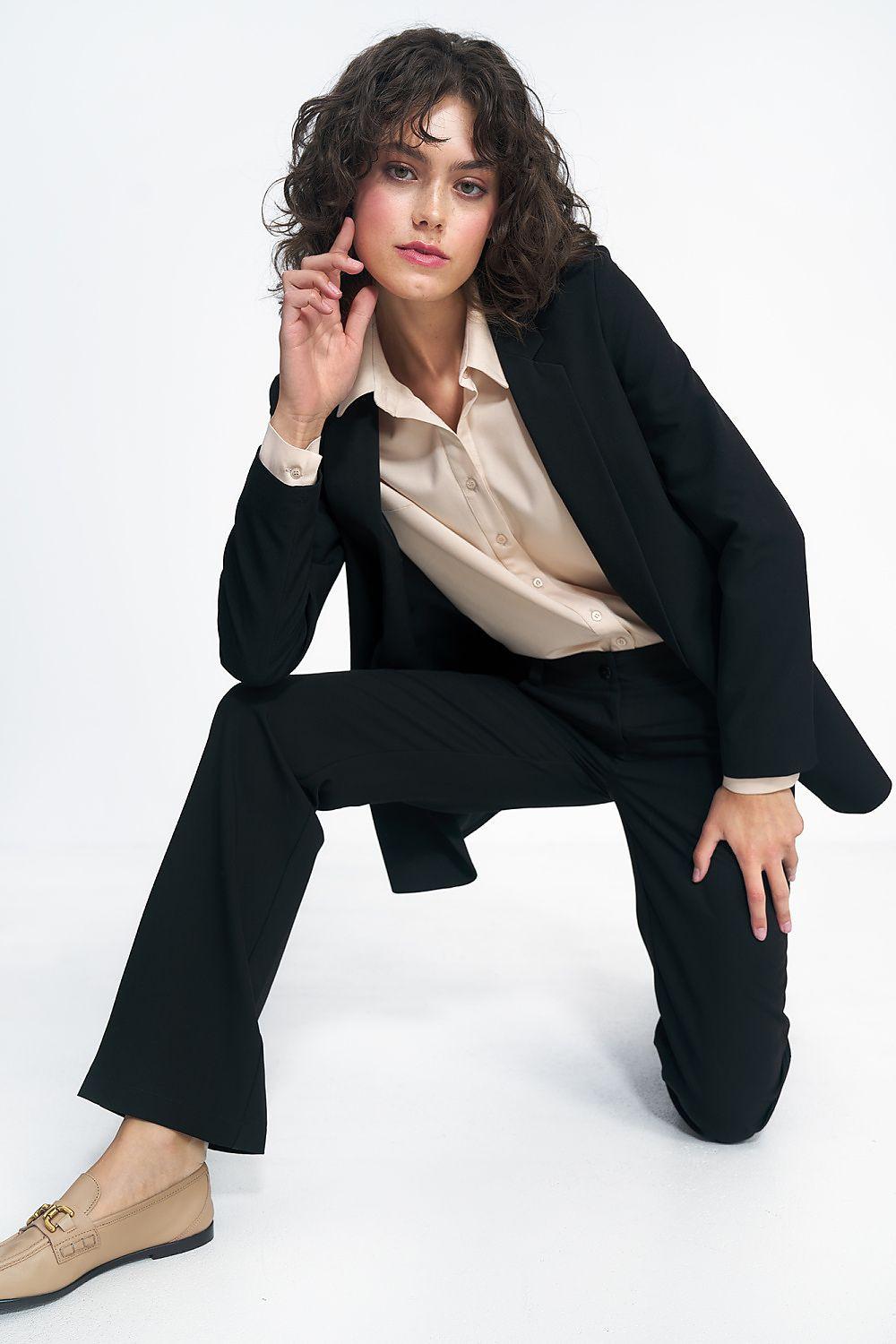 Women’s black blazer with notched lapels and long sleeves, button front
