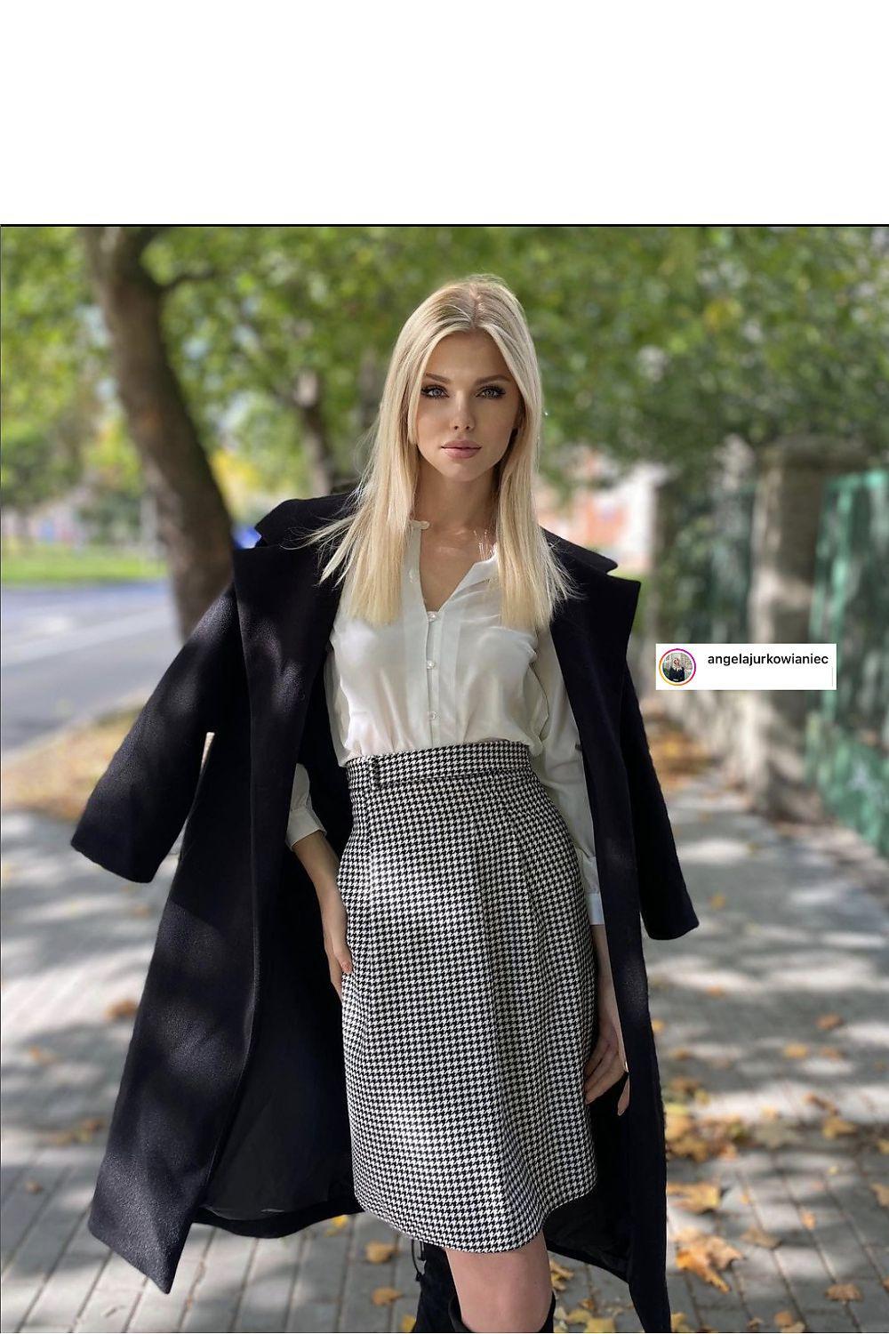 Black and white houndstooth A-line skirt with gathered waist, above-knee length