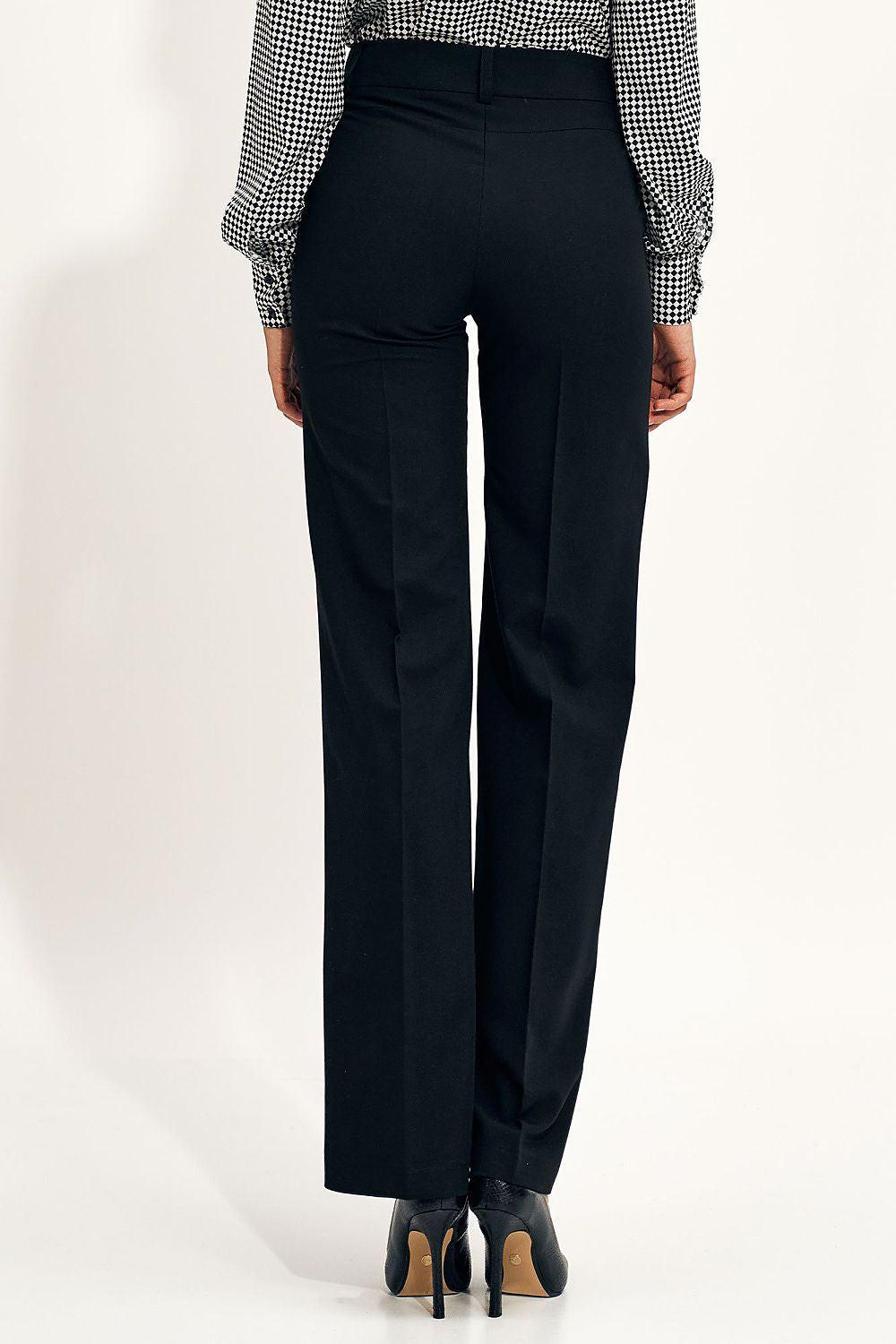 Nife black tailored trousers with belt loops and straight legs, back view