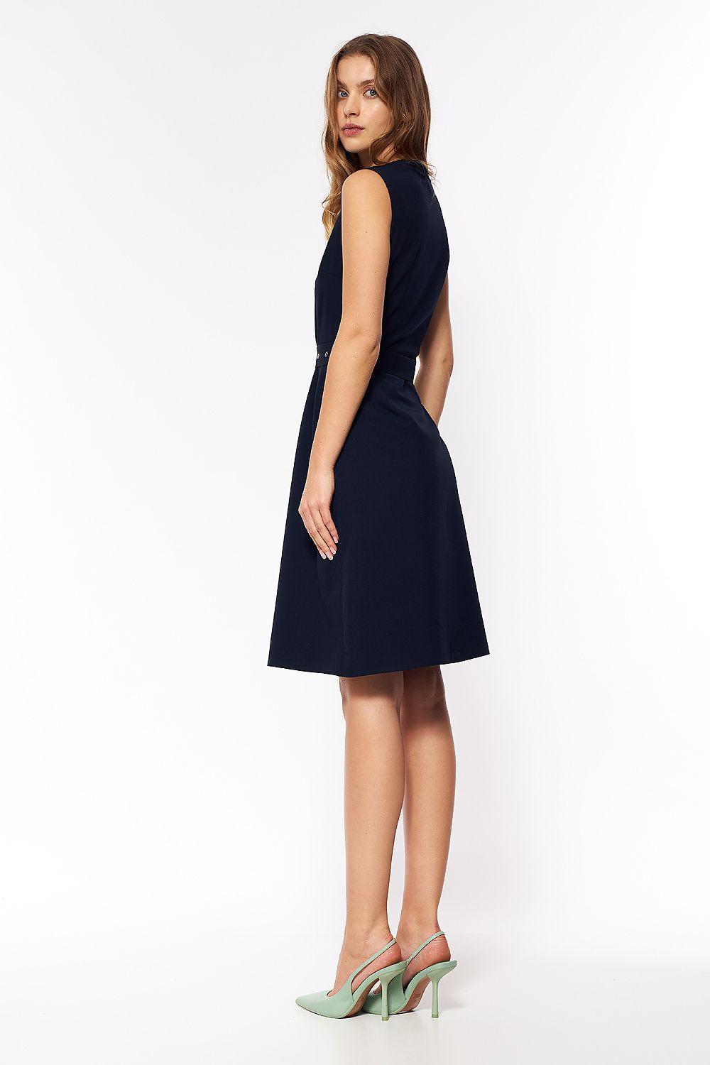 Navy blue sleeveless daydress with button front and flared midi skirt, side view