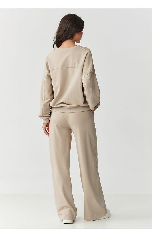 Women’s cotton tracksuit set in beige, back view of sweatshirt and wide-leg pants.