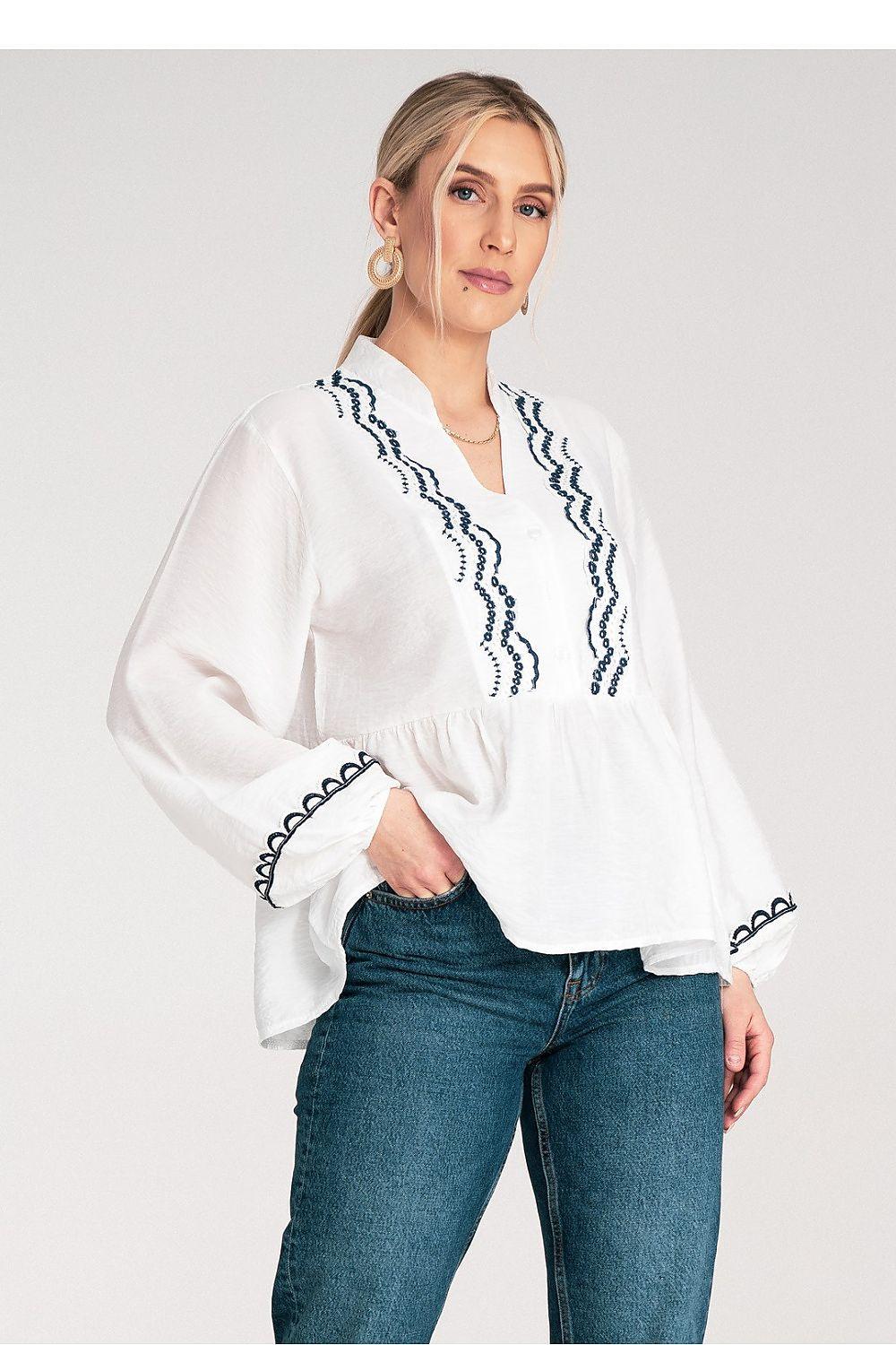 White Figl blouse with V neckline, long puff sleeves, blue embroidered panel, scalloped cuffs