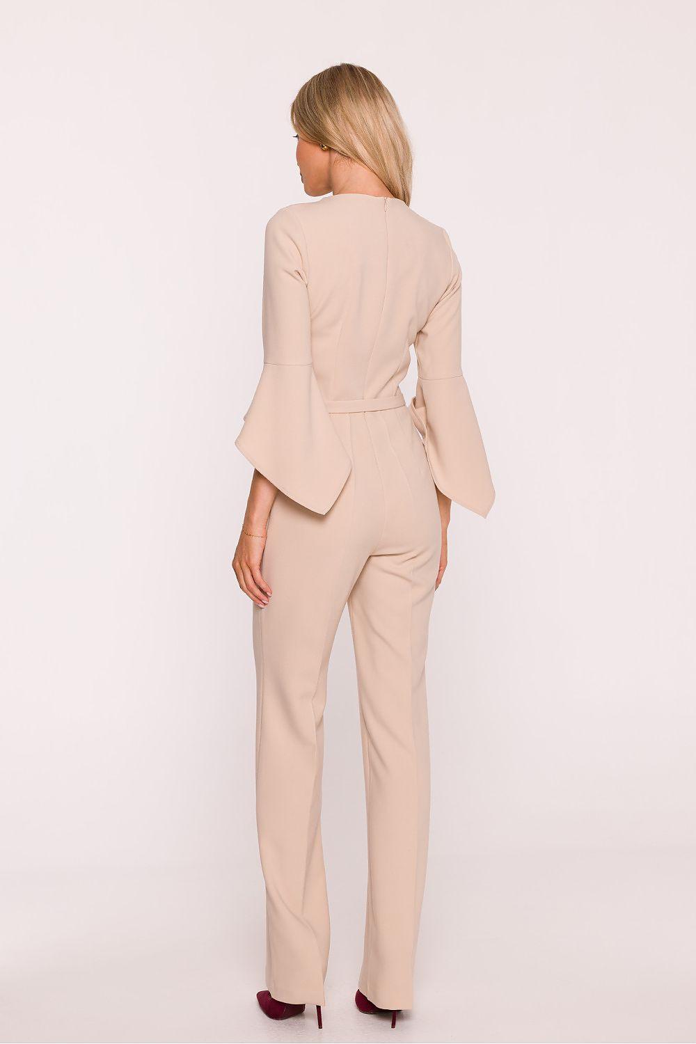 Women’s beige belted jumpsuit, long sleeves with flared cuffs, wide-leg trousers