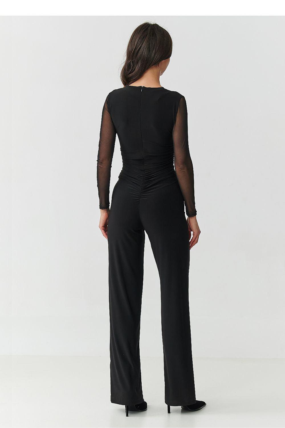 Back view of black V-neck jumpsuit with ruched waist and wide-leg pants