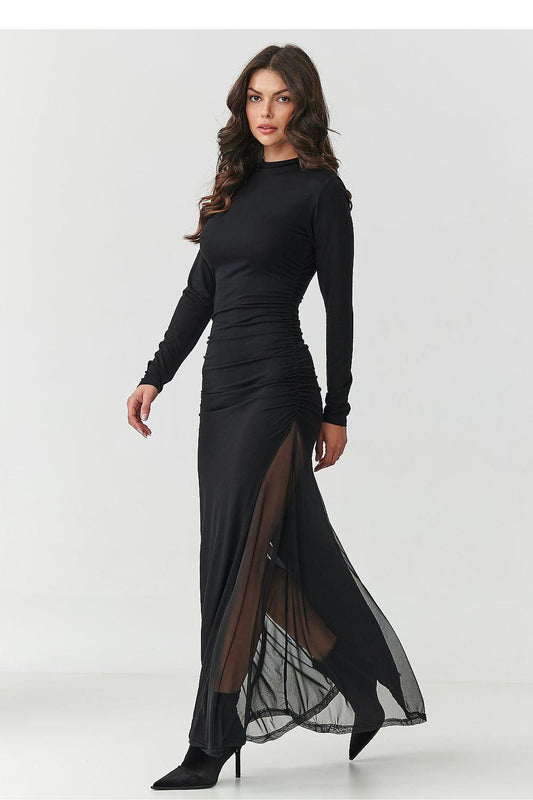 Black long-sleeve fitted maxi dress with ruched waist, side slit and sheer overlay hem