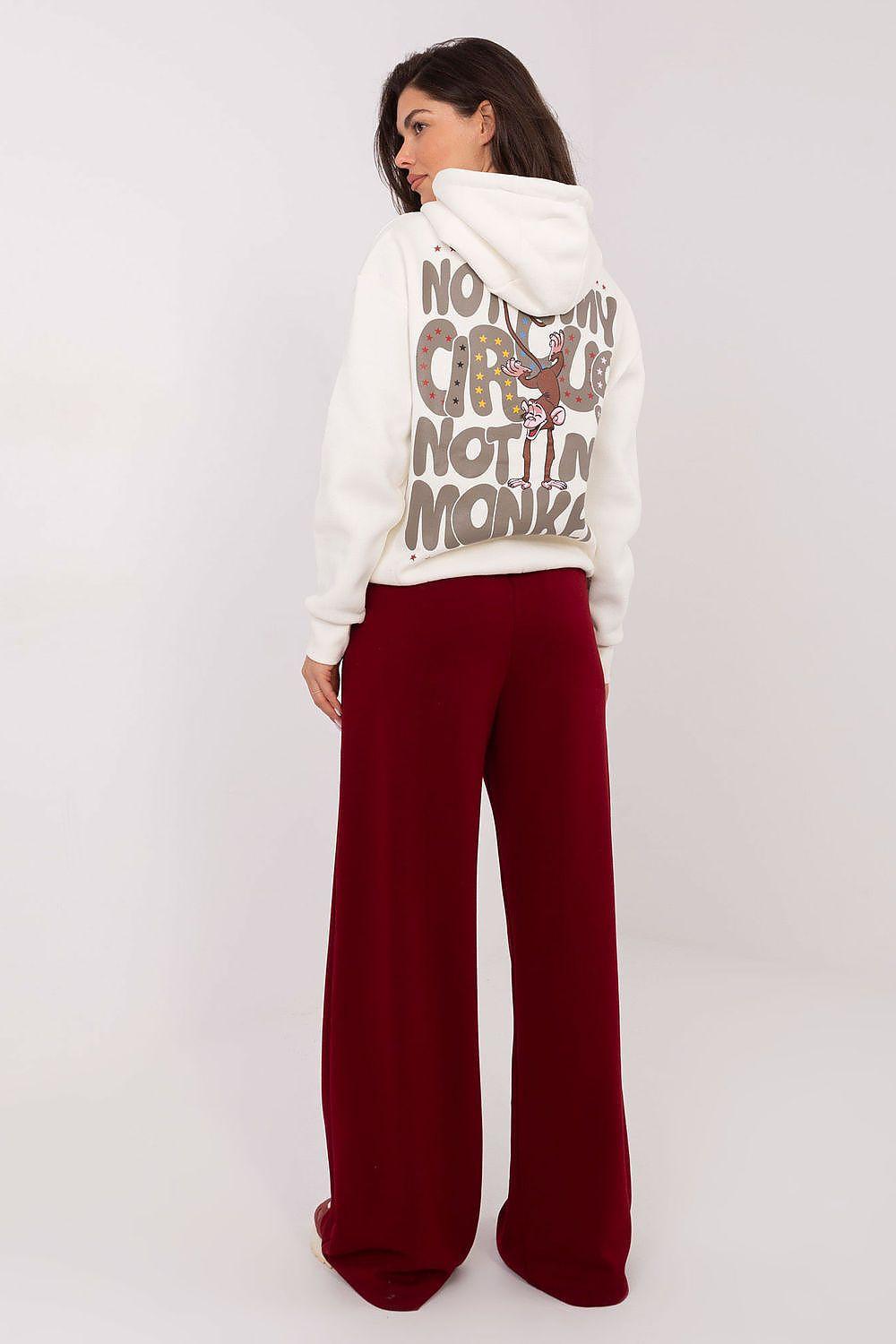 Tracksuit trousers, burgundy, drawstring waist, wide-leg drape at back view