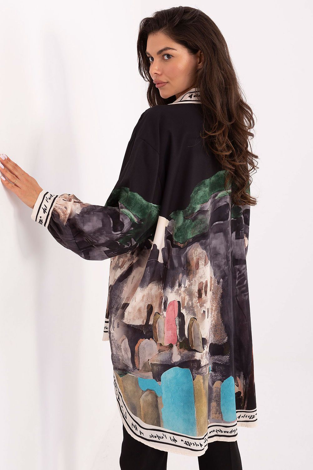 Women’s long sleeve shirt, back view, with abstract painterly print in dark tones and blue