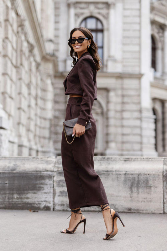 Burgundy button-up jacket and midi pencil skirt set with front slit, side view
