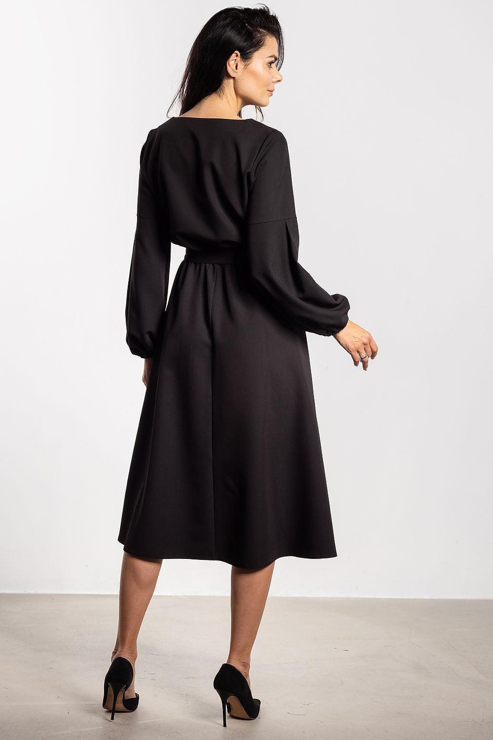 Awama daydress black with long sleeves and gathered belted waist, midi length