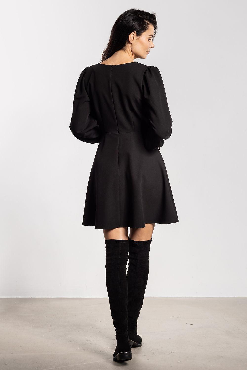 Black long-sleeve day dress with flared skirt, back view with puffed shoulders