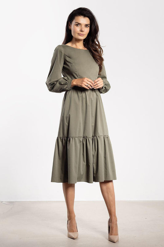 Olive midi daydress with long puff sleeves and tiered flared skirt, gathered at waist.