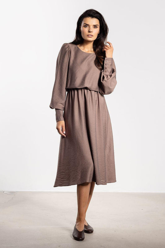 Brown midi daydress with gathered waist and long balloon sleeves, side view