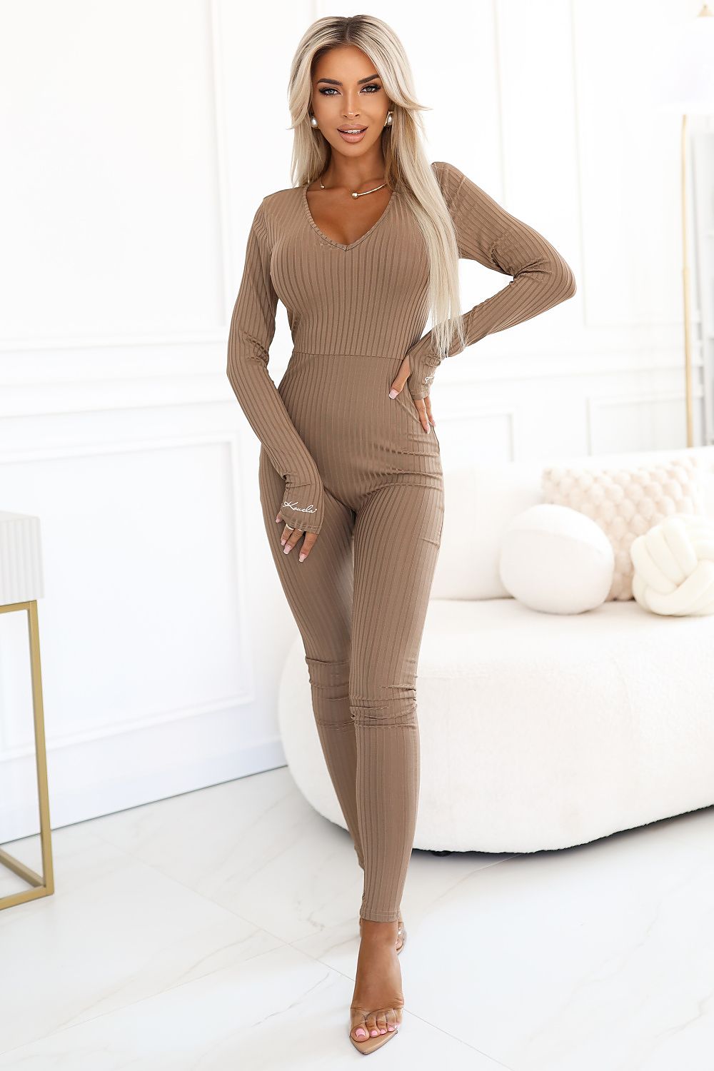 Beige striped V-neck long-sleeve jumpsuit with fitted legs