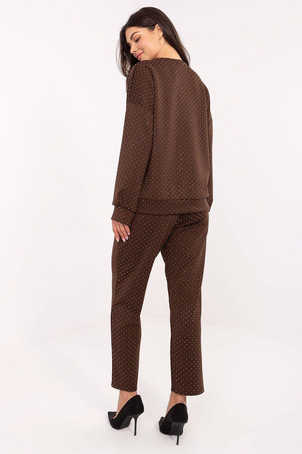 Brown dotted two-piece pants set, back view: long-sleeve top and tapered ankle pants