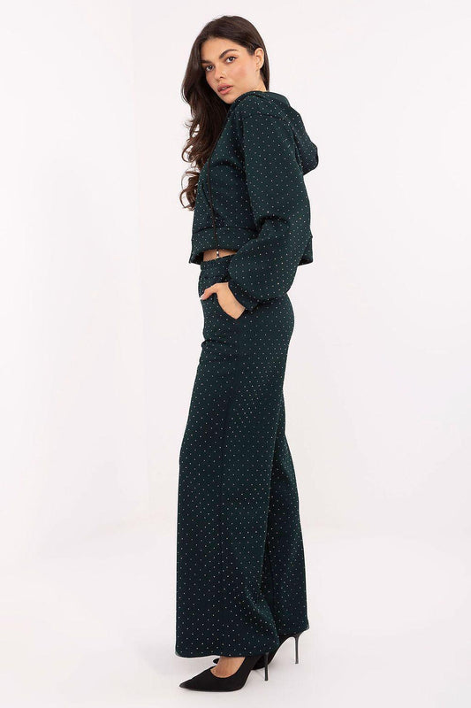 Two-piece hooded pants set in dark green with tiny allover print, side view wide-leg pants