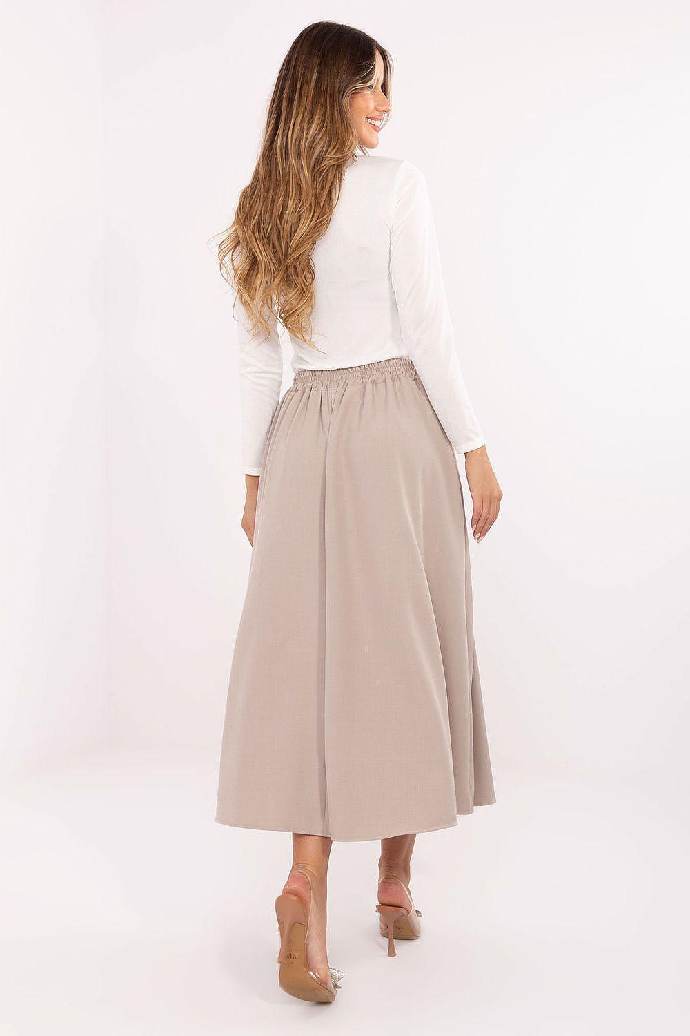 Beige midi skirt with pleated front and A-line silhouette, side view