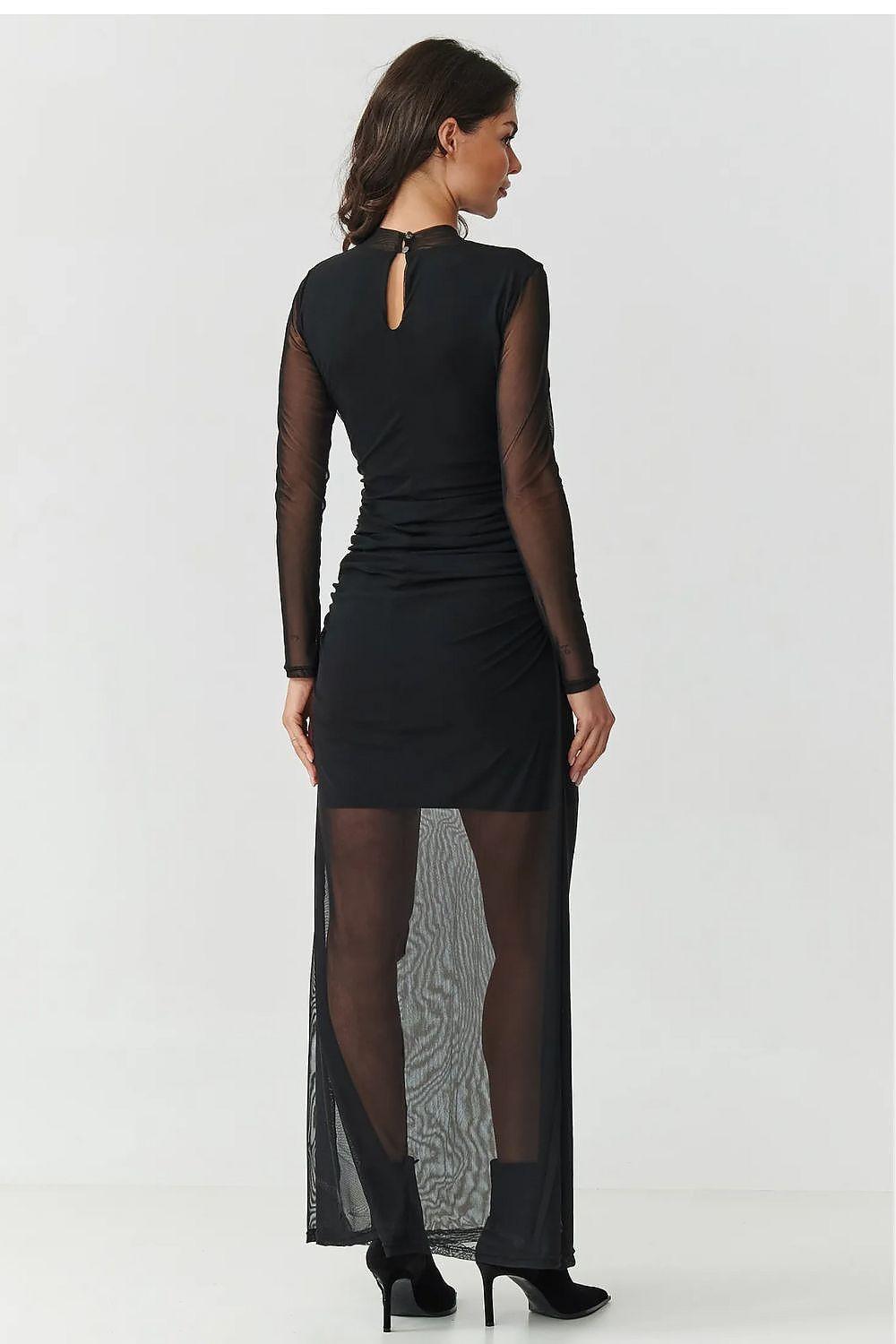 Black evening dress with keyhole back, fitted ruched silhouette and sheer mesh skirt