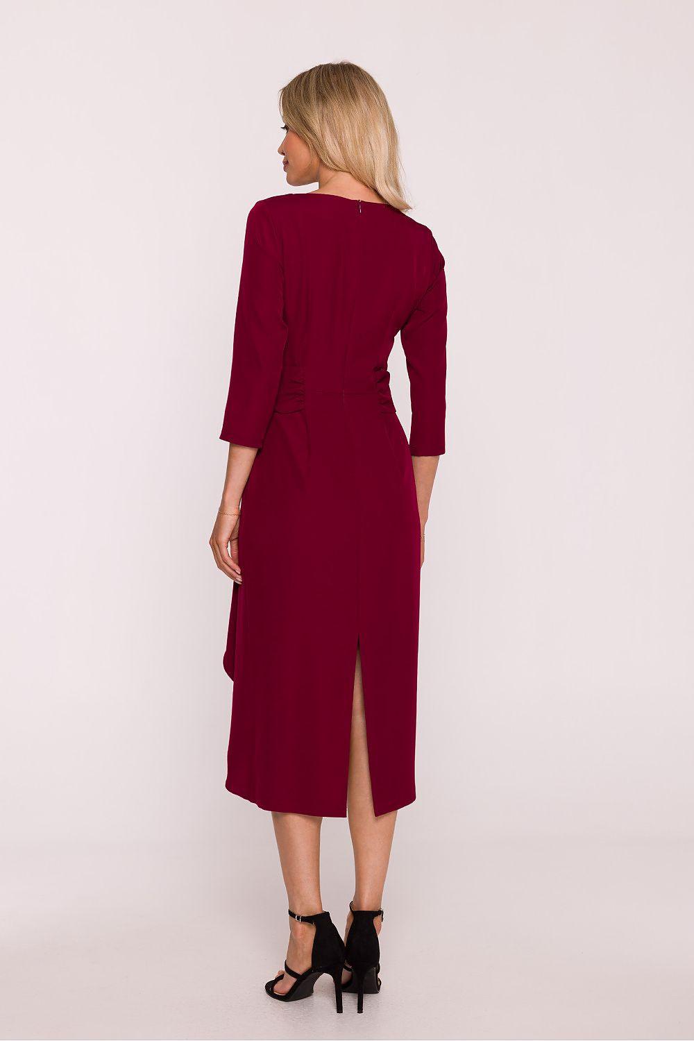 Red midi evening dress with long sleeves and back slit; fitted waist and midi skirt