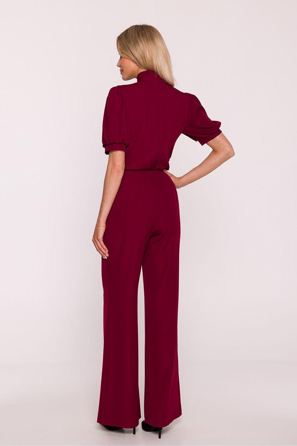Burgundy two-piece suit with puff sleeves blouse and wide-leg pants, side/back view