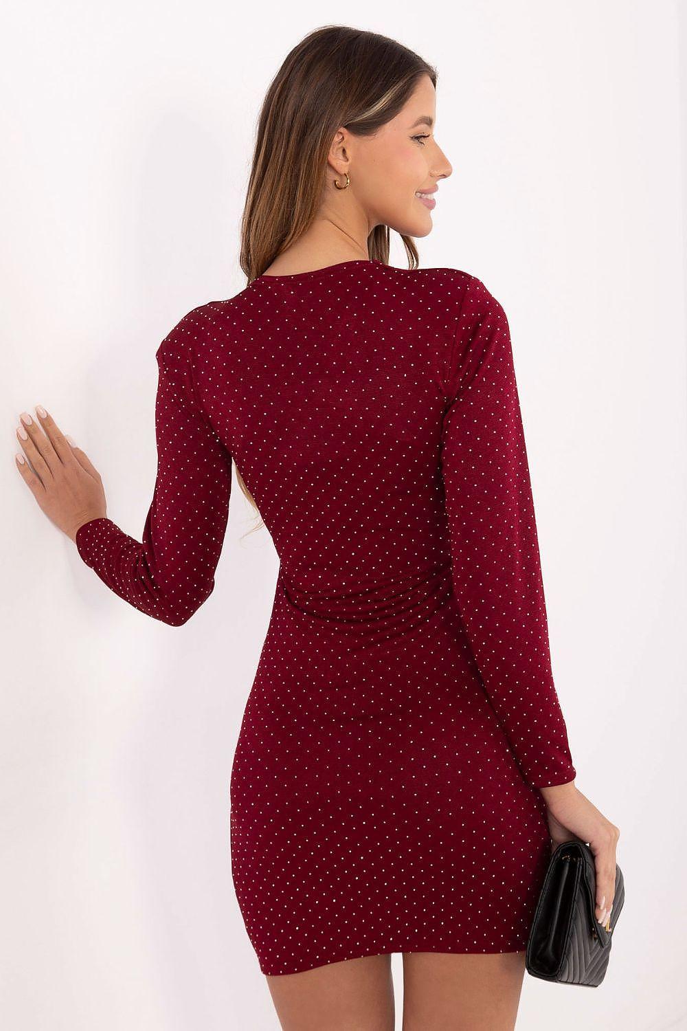 Burgundy short dress with long sleeves and tiny dotted pattern; V-neck front, draped back