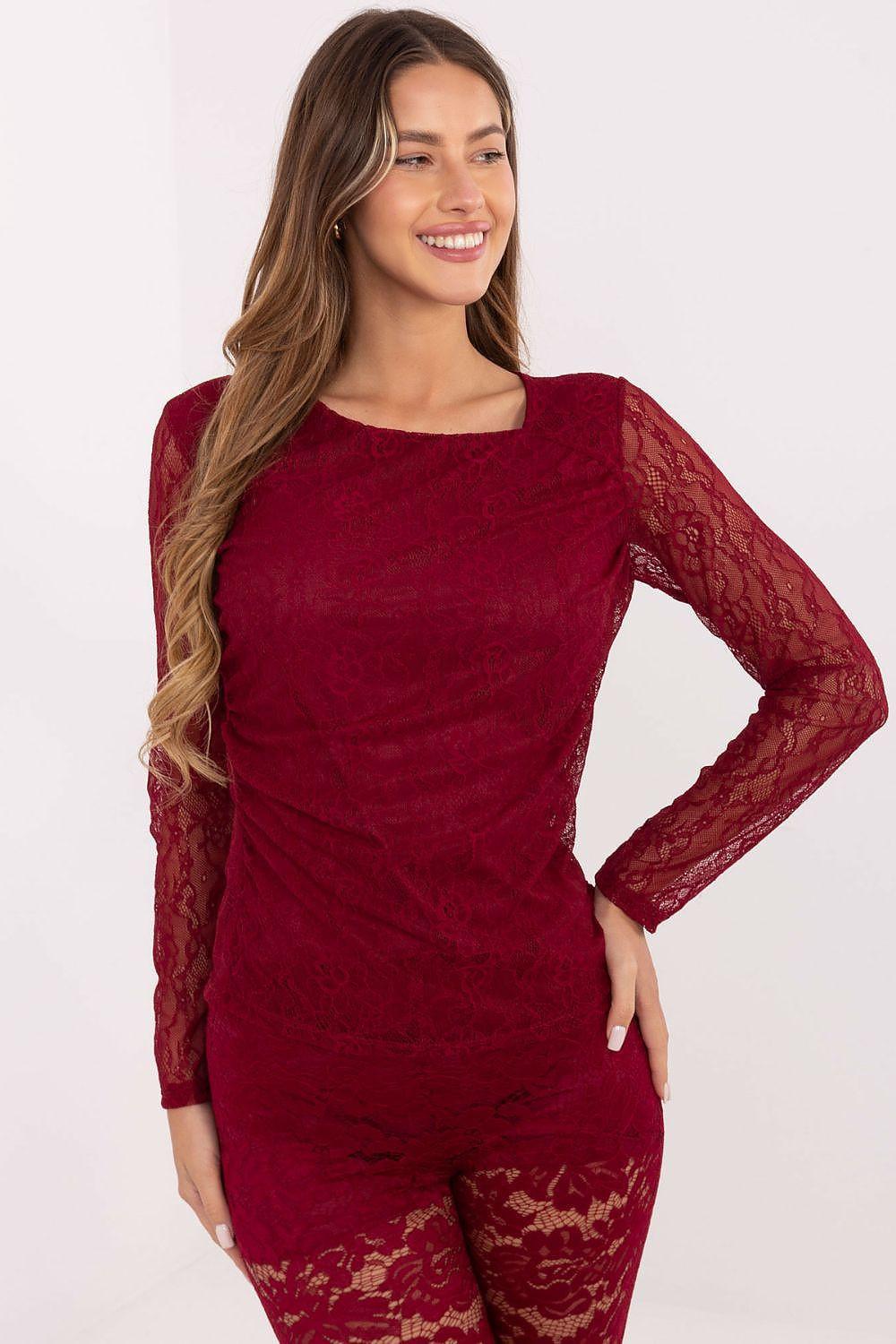 Red lace blouse with long sleeves, fitted lace top and lace hem detail
